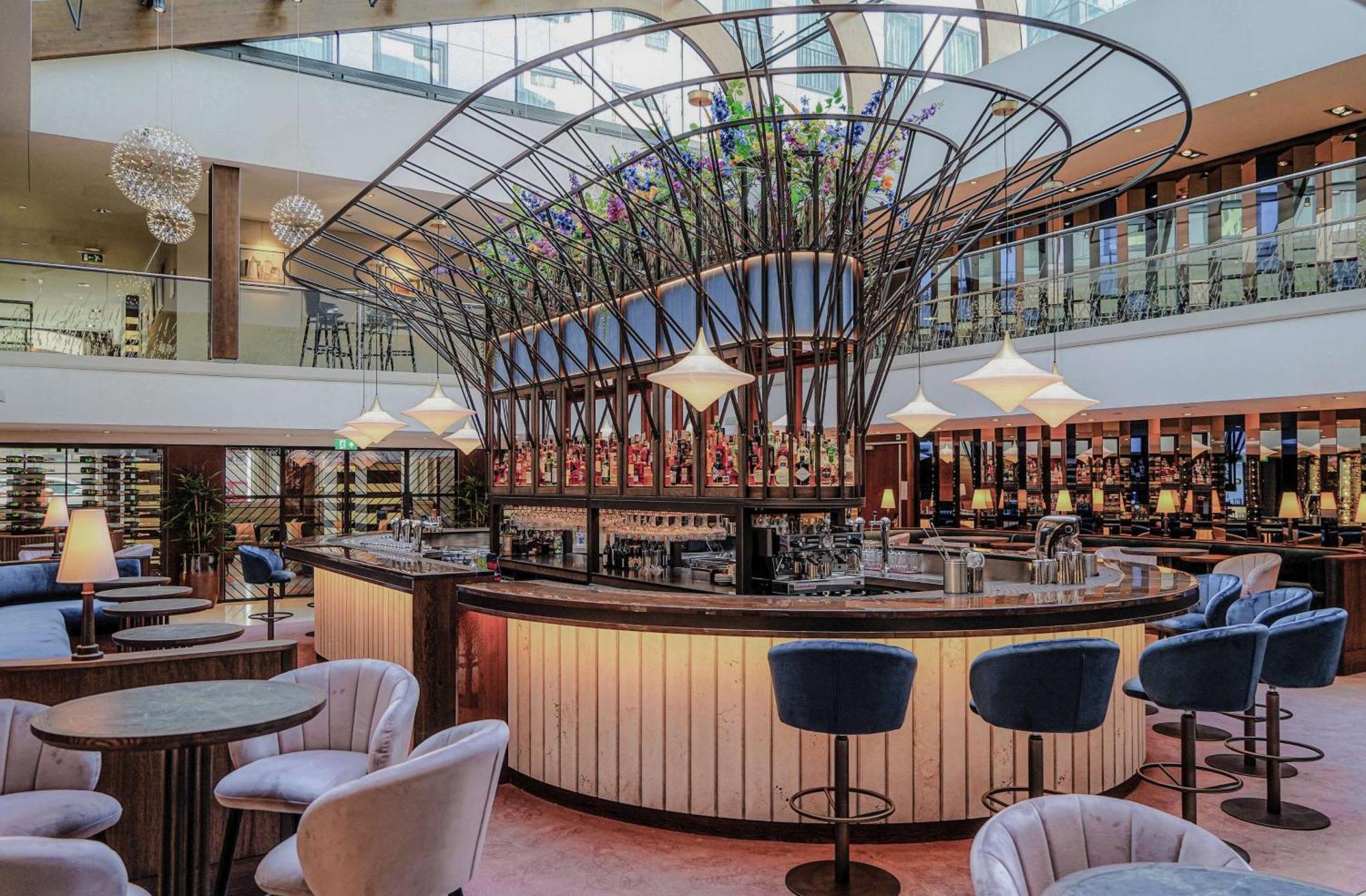 Hilton The Hague Hotel Exterior photo The bar at the 2018-opened, 100-metre-long, 1,000-seat, 10-storey, 10,000-square-metre (110,000 sq ft) terminal